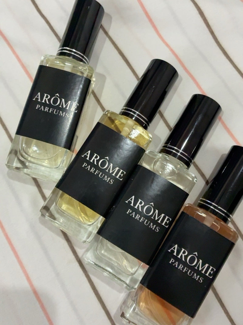 Fotografía real de perfumes y presentación ARÔME proporcionada por la tienda